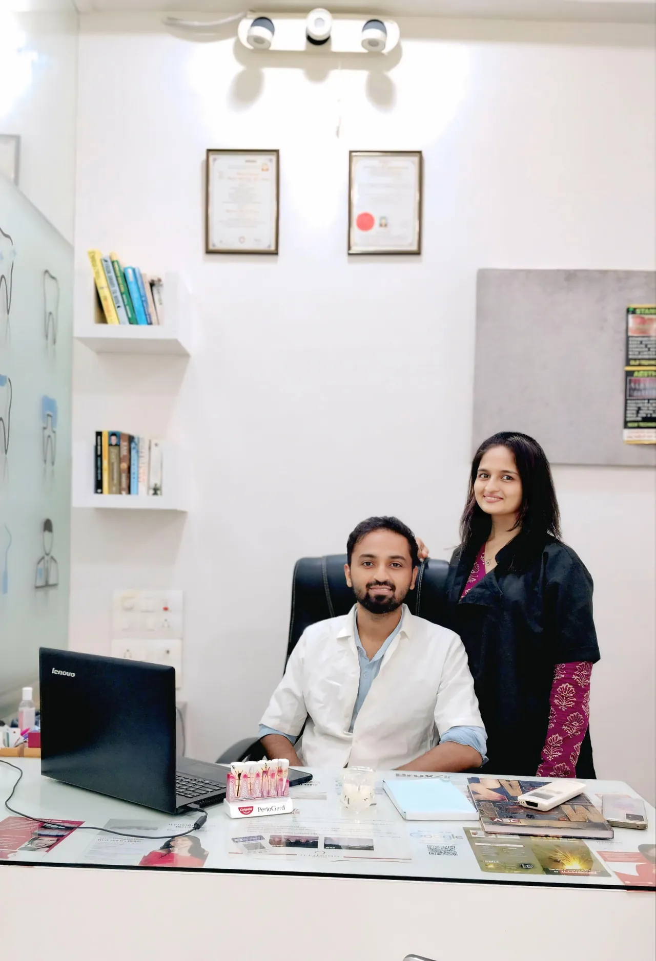 Two members of the Dental Planet team in the clinic consultation room